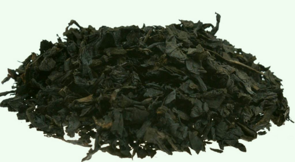Rich, dark Cavendish tobacco ready for packaging